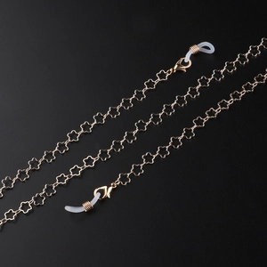 Chaîne fleurie dorée pour lunettes et masques avec boucles en silicone blanc
