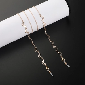 Chaîne à lunettes dorée avec breloques lune et boucles en silicone réglables pour femmes