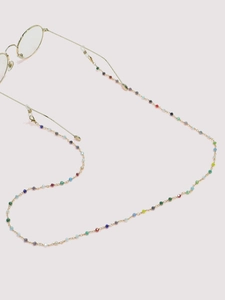 Detail of colorful crystal beads on gold chain with non-slip silicone loops for eyewear