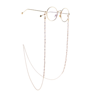 Chaîne de lunettes dorée minimaliste avec perles blanches élégantes et boucles en silicone