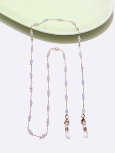 Detail of light purple pearls and gold chain eyewear strap with rubber loop fasteners