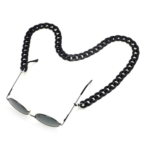 Matte black acrylic eyeglass chain with chunky heart-shaped design and non-slip loops