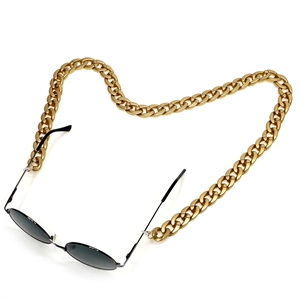 Matte gold acrylic glasses chain styled in a heart shape with black round sunglasses