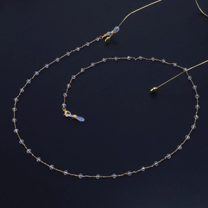Elegant gold glasses chain with transparent crystal beads and non-slip silicone loops