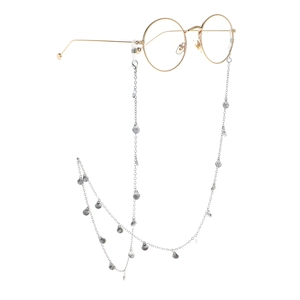 Silver chain glasses strap with small shell charms and gold round frame glasses