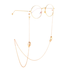 Chaîne de lunettes dorée minimaliste avec coquillages gaufrés et lunettes rondes dorées