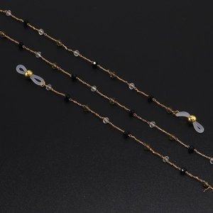 Chaîne de lunettes faite main avec perles de cristal noires et ambrées sur cordon doré