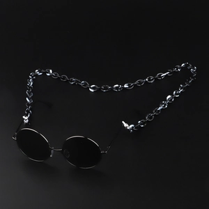 Minimalist black round sunglasses with chic black and white marble acrylic link chain