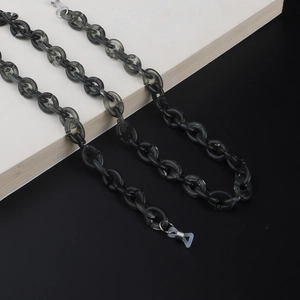 Detail of dark gray translucent acrylic eyewear chain with silicone loop connectors