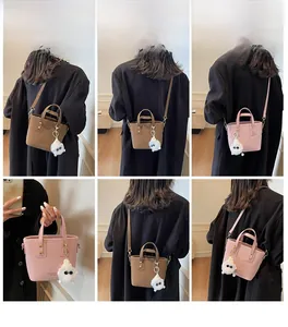 Detail shots of mini bucket bags with plush charms showing hand-held and crossbody styling