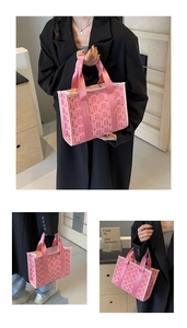 Close-up of pink canvas tote bag with red double happiness jacquard embroidery details