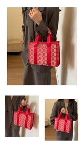 Detail of red wedding tote bag featuring traditional Chinese Xi pattern jacquard weave