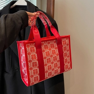 Red wedding tote bag featuring traditional Chinese embroidery and sturdy woven handles