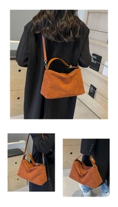 Detail view of brown matte suede tote bag with leather straps and large capacity
