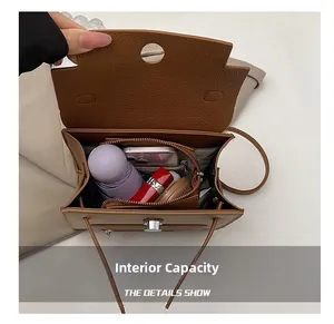 Top view of brown lychee grain leather handbag showing spacious internal capacity