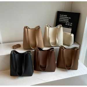 Detailed set of leather tote bags in five colors with matching inner pouch and strap