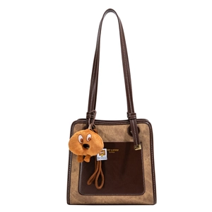 Retro canvas and leather tote bag with brand print and plush puppy charm