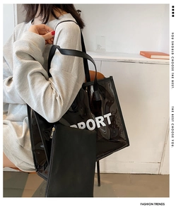 Detailed view of black semi-transparent PVC sport tote bag with leather inner pouch