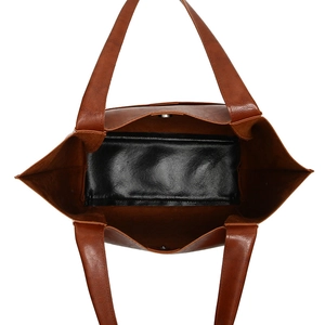 Large brown leather tote bag with wide interior and magnetic buckle for daily commute