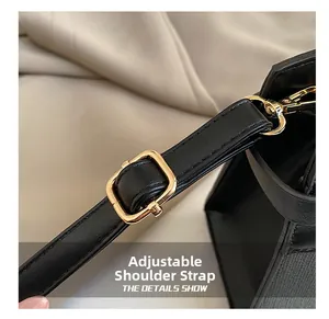 Detail of adjustable black leather strap with gold buckle and precise stitching
