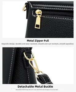 Detailed macro view of litchi grain leather texture and gold hardware on black crossbody bag