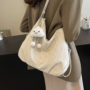 Minimalist beige tote bag with marble pattern and cute plush cloud keychain charm