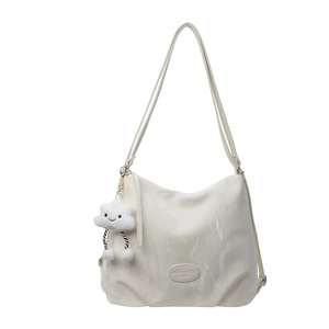 Elegant off-white faux leather tote bag with a cute plush cloud charm for summer fashion