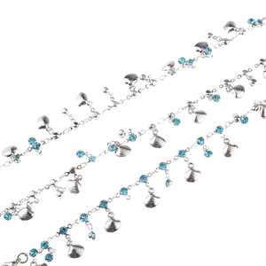 Bohemian gold chain eyewear strap with seashell charms and blue rhinestones