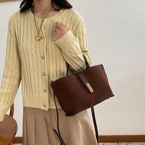 Brown suede leather tote bag with gold buckle fastener for elegant casual styling