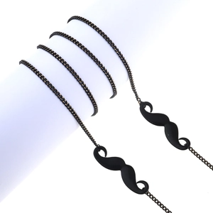 Non-slip black metal eyeglass chain featuring mustache pendants for a retro look