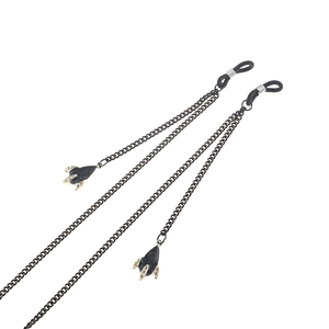 Minimalist black eyewear chain with rocket-shaped pendants and anti-slip rubber loops