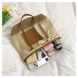 Detailed interior of a woven tote bag showing daily items like phone and umbrella
