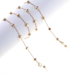 Chaîne de lunettes élégante or rose avec breloques cœur et boucles réglables en silicone