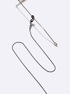 Detail of 1.2mm gunmetal grey snake chain with lobster clasp and black silicone loops