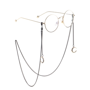 Chaîne de lunettes noire minimaliste avec pendentif lune dorée et monture vintage dorée