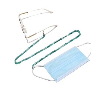 Detail of green and white resin eyeglass chain with versatile hooks and silicone loops