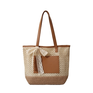 Handwoven straw tote bag with brown PU pocket and white lace bow for summer beach travel