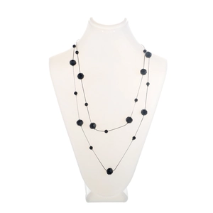 Double-layered long necklace with black crystal beads and silver chain on a neck mannequin