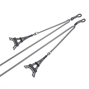 Fashionable black eyewear chain featuring Eiffel Tower charms and adjustable rubber loops