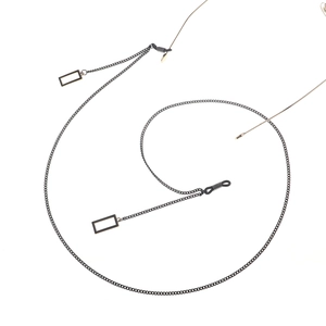 Minimalist black glasses chain with geometric rectangular pendants on white background