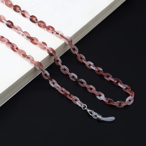 Close-up of marble acrylic eyewear chain with lobster clasp and silicone loop