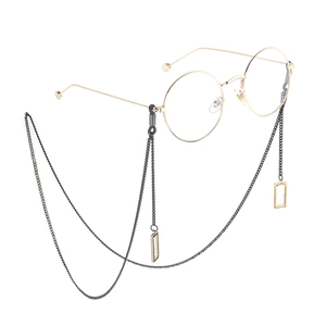 Round gold frame glasses with elegant black bead chain and gold rectangular pendants