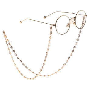 Golden round frame glasses with ornate hollow crown design metal eyewear chain strap
