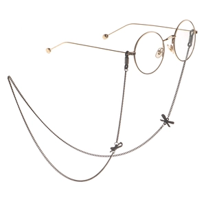Retro gold round glasses with elegant black metal chain and delicate bow pendant