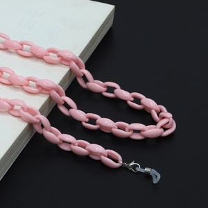 Detail of pink jelly acrylic glasses chain with lobster clasp and silicone loop connectors