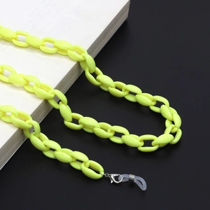 Detail of neon yellow acrylic glasses chain with metal clasp and silicone loops