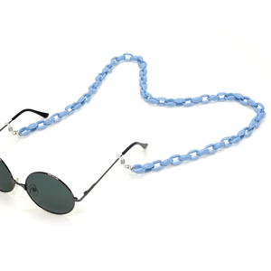 Close-up of light blue acrylic link eyeglass chain with metal hooks on black sunglasses