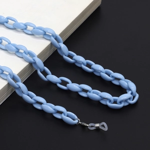Close-up of light blue acrylic eyewear chain with silver lobster clasp and silicone loop