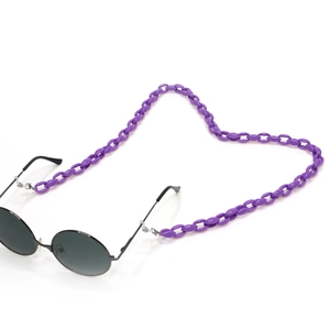 Detail of purple acrylic chunky chain link eyeglass strap with black round sunglasses