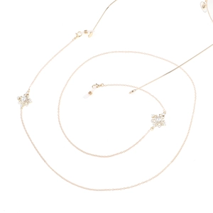 Chaîne de lunettes dorée avec pendentifs fleurs en perles et boucles en silicone